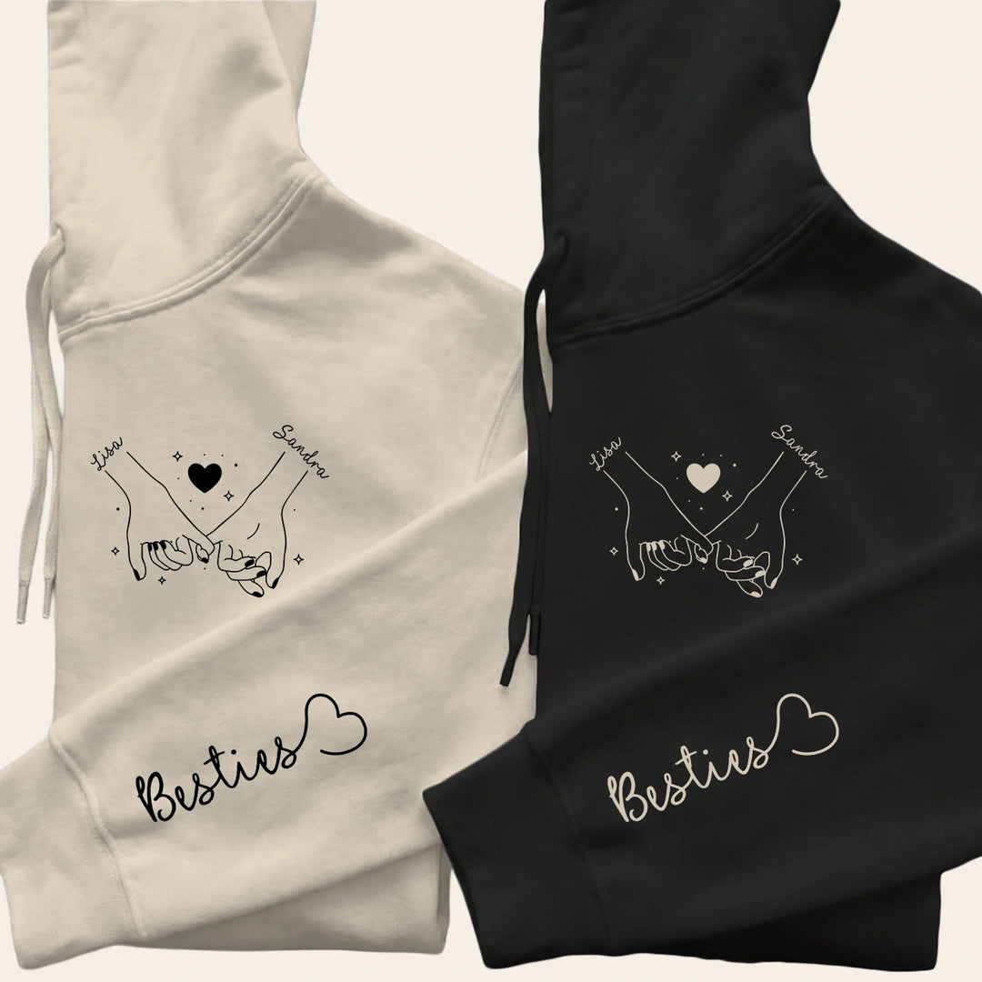 Personalisierte Partnerlook Hoodies “Besties” (mit Ärmeldruck)