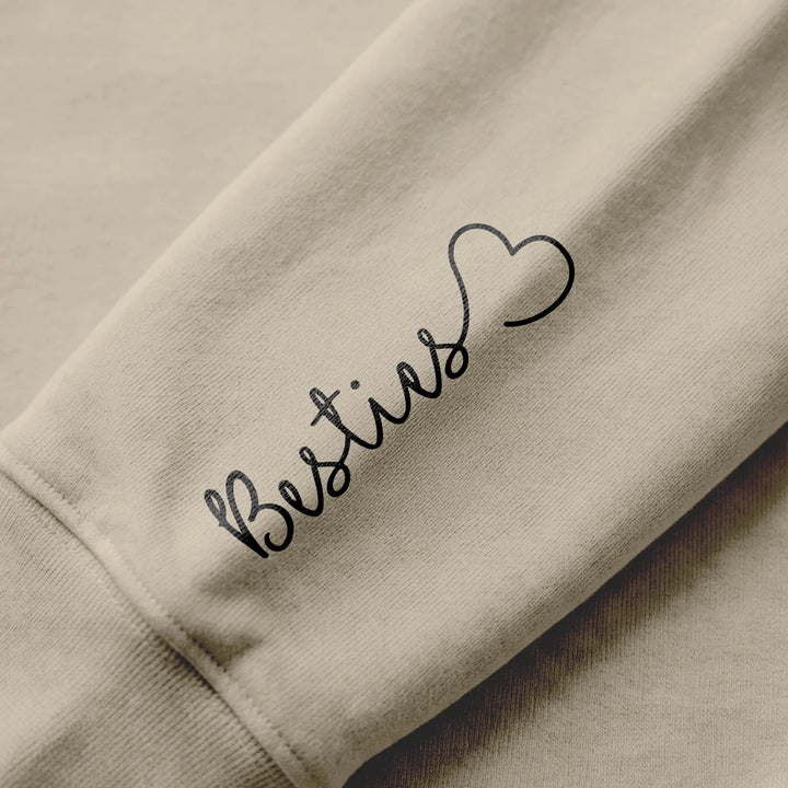 Personalisierte Partnerlook Hoodies “Besties” (mit Ärmeldruck)