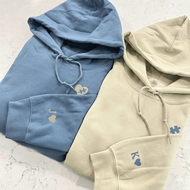 Personalisierte Partnerlook Hoodies "Puzzlestück" (mit Ärmeldruck)