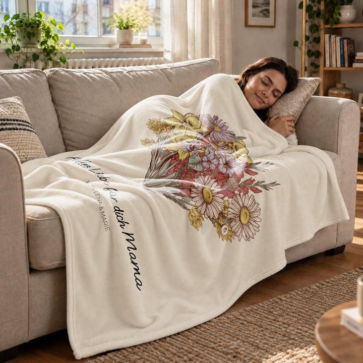 Frau schläft unter der Blumenstrauß-Decke