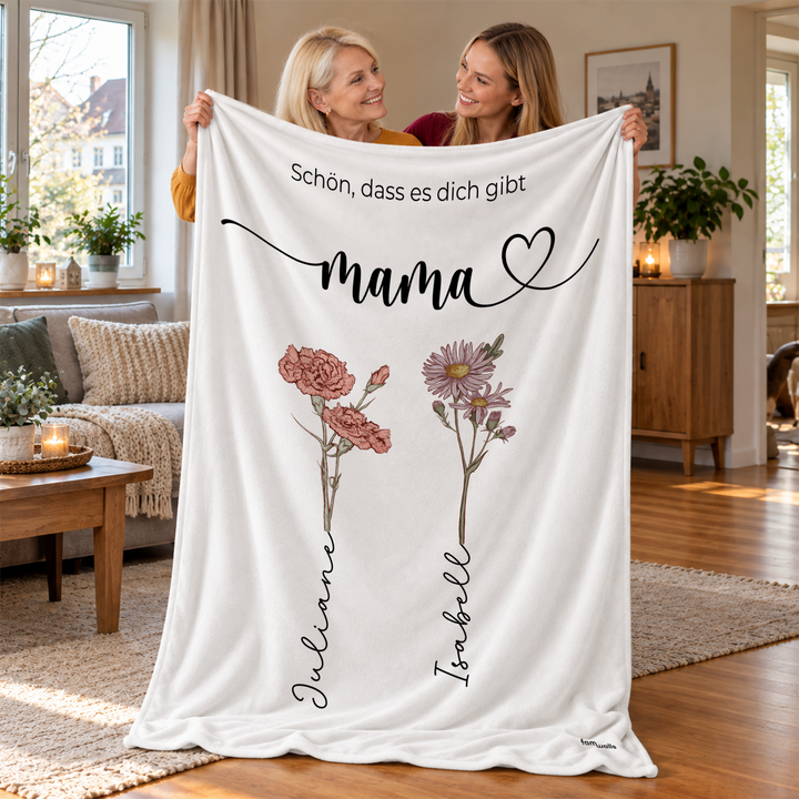 Mutter und Tochter halten Decke „Schön, dass es dich gibt“