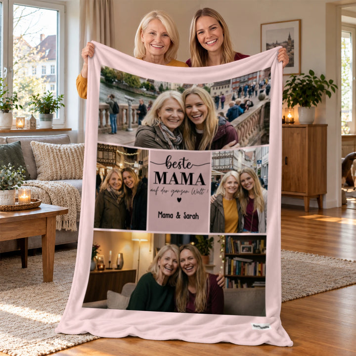 Mutter und Tochter mit rosa Fotodecke „Beste Mama“ und gemeinsamen Fotos